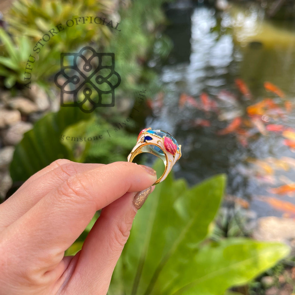 แหวนลงยาโบราณประดับบลูโทปาส รุ่น “Azure Majesty”  Azure Majesty – Royal Enamel Blue Topaz Ring