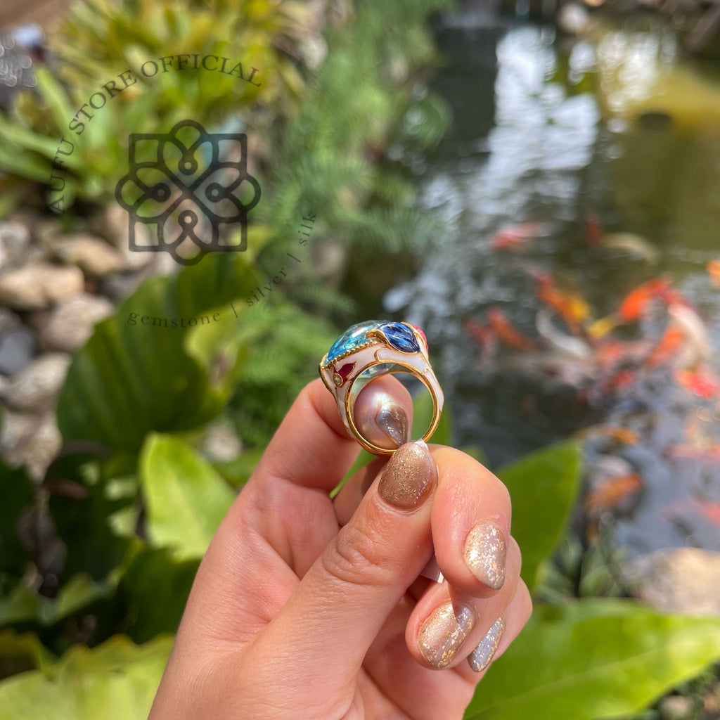 แหวนลงยาโบราณประดับบลูโทปาส รุ่น “Azure Majesty”  Azure Majesty – Royal Enamel Blue Topaz Ring