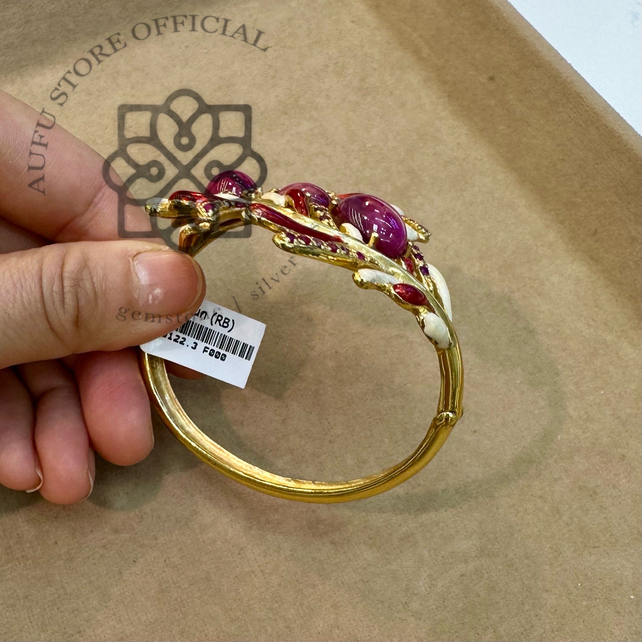 กำไลทับทิมลงยา รุ่น “Royal Ruby Fern” “ศิขราสชาดา” Royal Ruby Fern – Ruby Cabochon Enamel Heritage Bangle